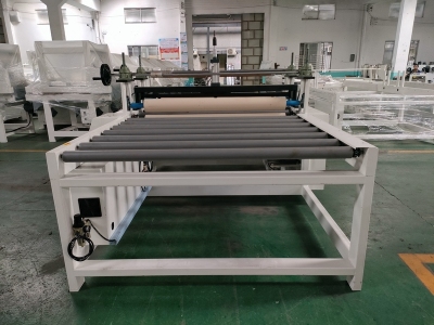 Automatic film covering and cutting machine